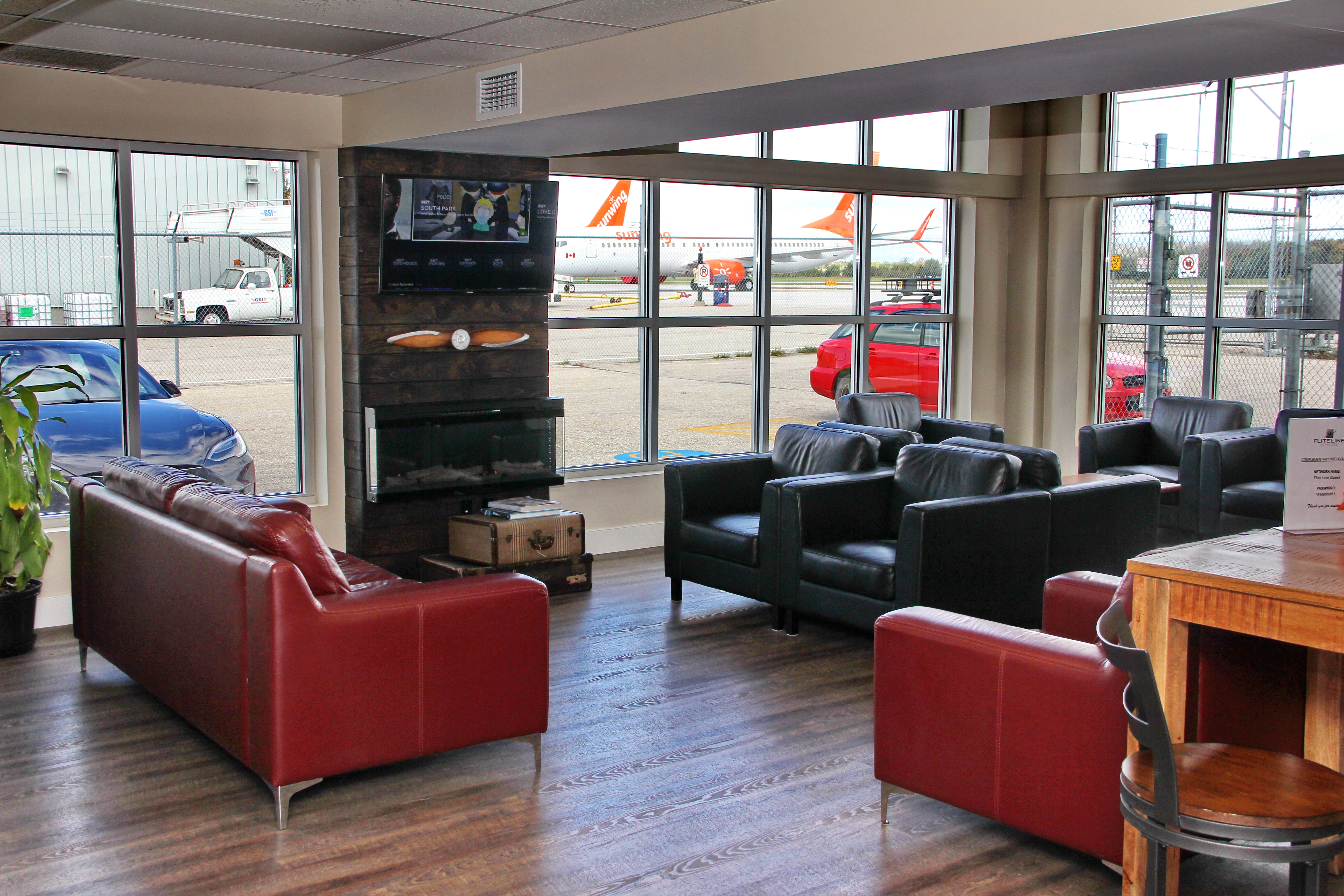 FBO passenger lounge at YKF Kitchener-Waterloo Shell AeroCentre with complimentary refreshments